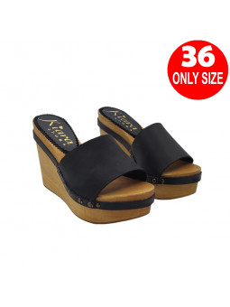 Schwarze Keilclogs aus...